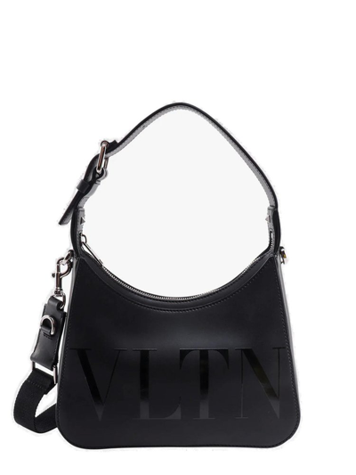 Shop Valentino Garavani Vltn Top Handle Bag In Black