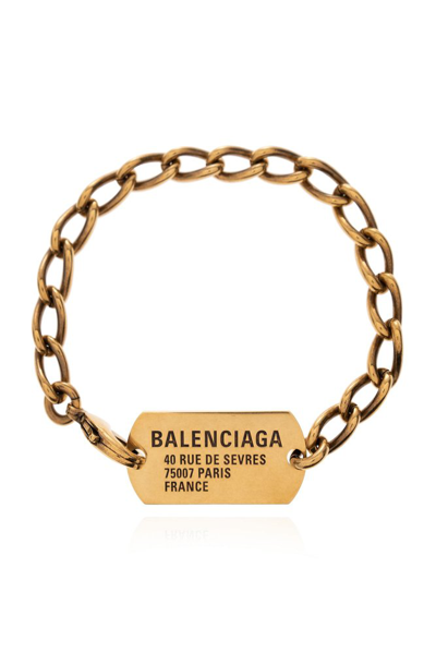 Shop Balenciaga Logo Engraved Bracelet In Gold