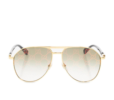 Shop Gucci Eyewear Aviator Framed Monogrammed Sunglasses In Multi