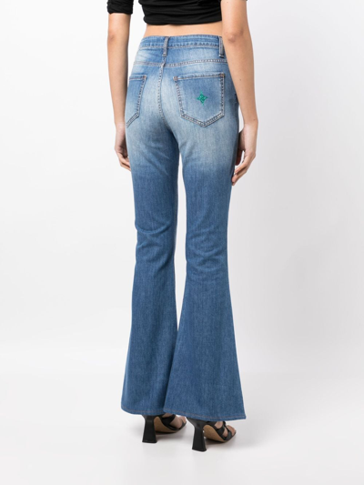 Shop Madison.maison Star-print High-rise Flared Jeans In Blue