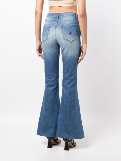 Shop Madison.maison Star-print High-rise Flared Jeans In Blue