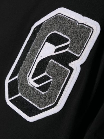 Shop Givenchy Logo-appliqué Organic-cotton T-shirt In Black