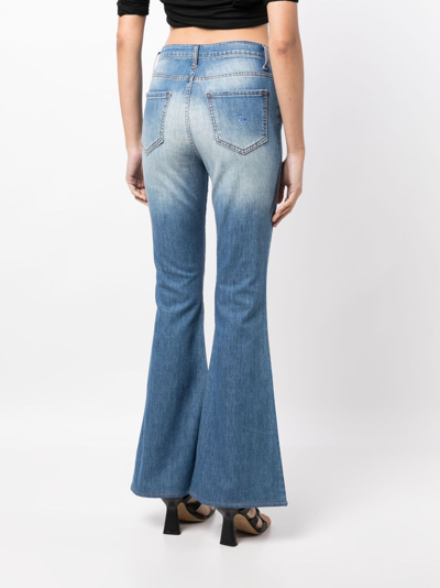 Shop Madison.maison Star-print High-rise Flared Jeans In Blue