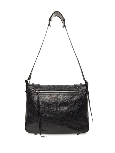 Shop Balenciaga Le Cagole Leather Messenger Bag In Schwarz