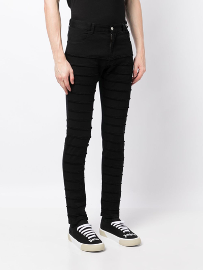 Shop Undercoverism Distressed-effect Skinny Trousers In Schwarz