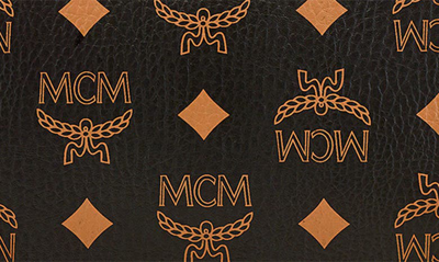 Shop Mcm Medium Aren Coated Canvas Wristlet In Black