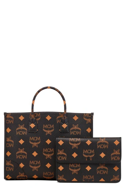 Shop Mcm Large Munchen Visetos Coated Canvas Tote In Black