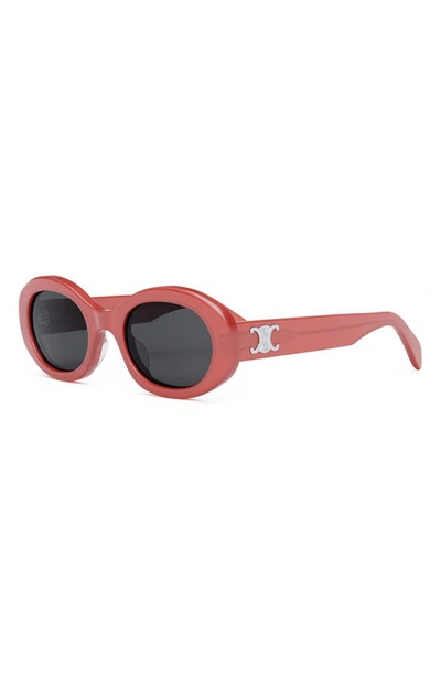 Shop Celine Triomphe 52mm Oval Sunglasses In Shiny Red / Smoke