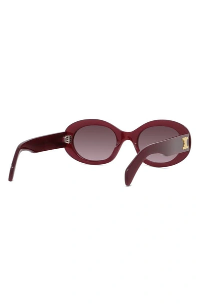 Shop Celine Triomphe 52mm Oval Sunglasses In Shiny / Gradient Bordeaux