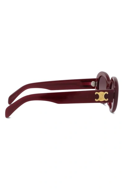 Shop Celine Triomphe 52mm Oval Sunglasses In Shiny / Gradient Bordeaux
