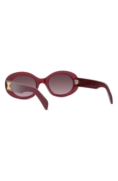 Shop Celine Triomphe 52mm Oval Sunglasses In Shiny / Gradient Bordeaux