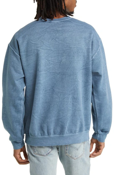 Shop Alpha Collective Earth Day Graphic Crewneck Sweatshirt In Washed Blue