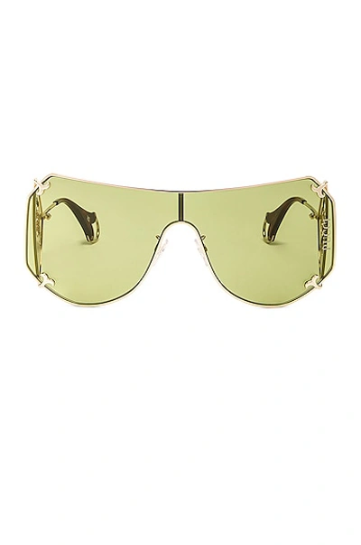 Shop Emilio Pucci Shield Sunglasses In Shiny Pale Gold & Green