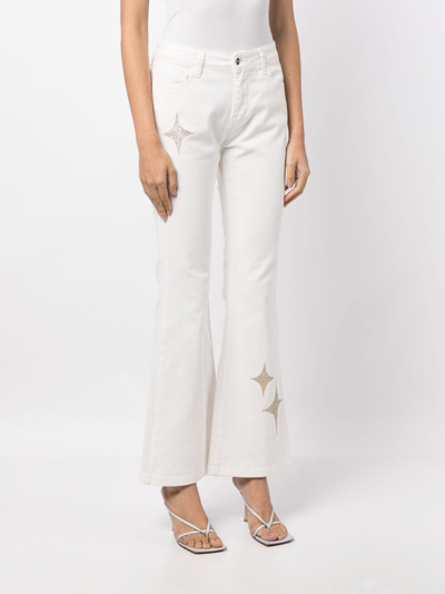 Shop Madison.maison Star-print High-rise Flared Jeans In Weiss