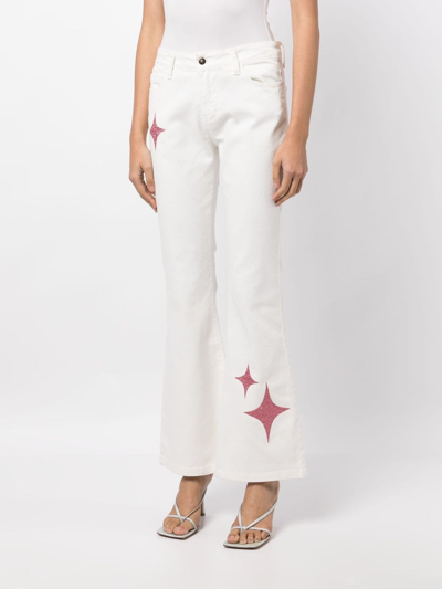 Shop Madison.maison Star-print High-rise Flared Jeans In Weiss