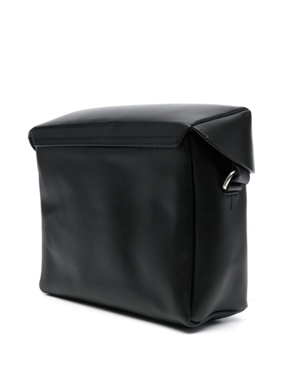 Shop Jil Sander Logo-embossed Crossbody Bag In Black