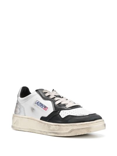 Shop Autry Super Vintage Distressed Leather Sneakers In Weiss