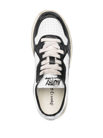 Shop Autry Super Vintage Distressed Leather Sneakers In Weiss