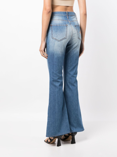 Shop Madison.maison Star-print High-rise Flared Jeans In Blau