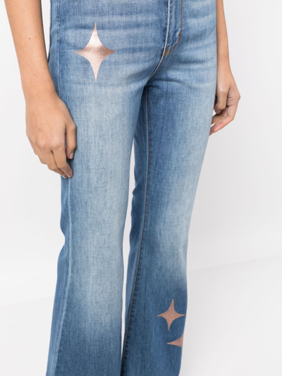 Shop Madison.maison Star-print High-rise Flared Jeans In Blau