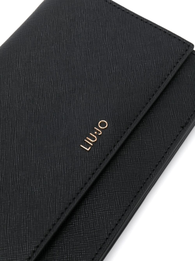 Shop Liu •jo Logo-embossed Faux-leather Crossbody Bag In Schwarz