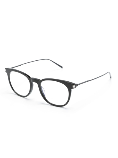 Shop Saint Laurent Engraved-logo Round-frame Glasses In Schwarz