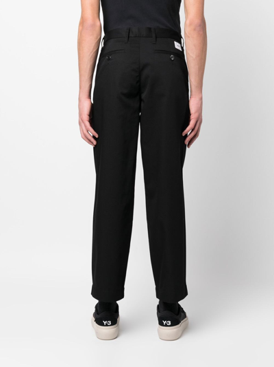 Shop Wtaps Logo Patch Straight-leg Trousers In Black