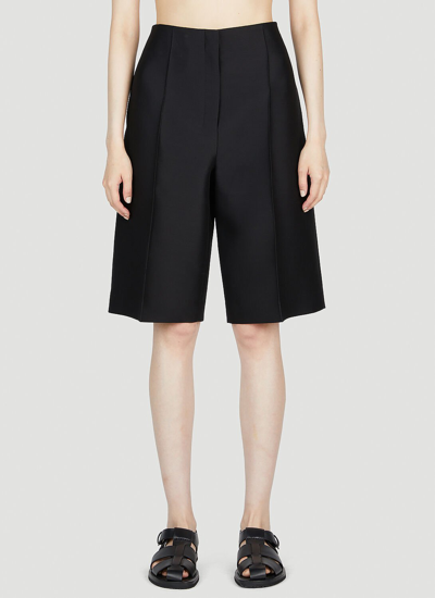 Shop The Row Pleated Bermuda Shorts In Black