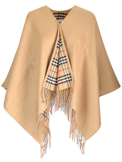 Shop Burberry Checked Reversible Cape In Beige
