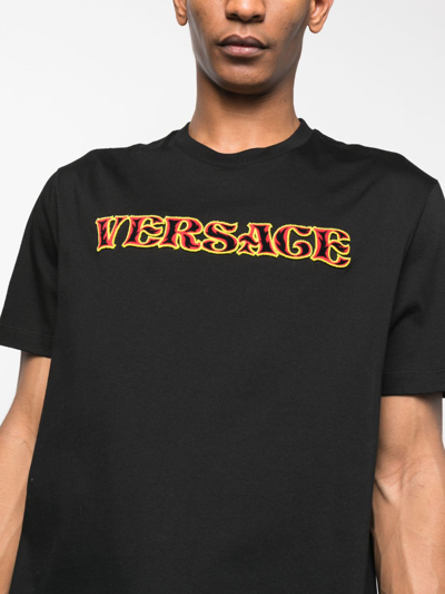 Shop Versace Logo-appliqué Cotton T-shirt In Black