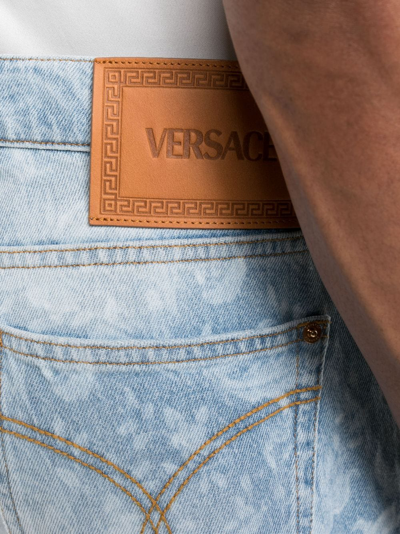 Shop Versace Allover Denim Shorts In Blue