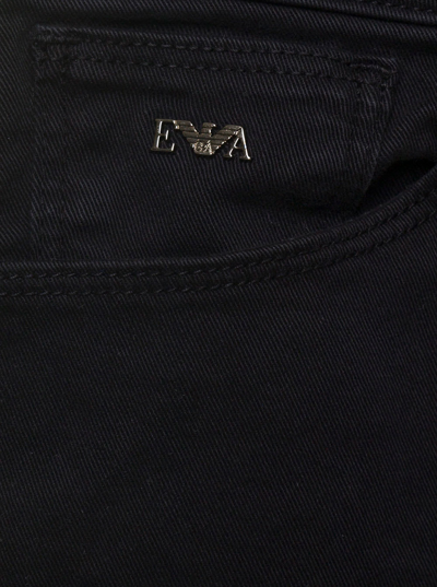 Shop Emporio Armani Black Five-pocket Jeans With Metal Logo Patch In Stretch Cotton Denim Boy