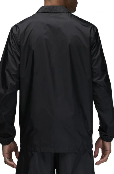 Shop Nike Jordan Essentials Woven Jacket In Black/ White