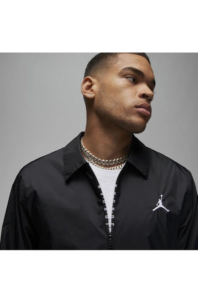 Shop Nike Jordan Essentials Woven Jacket In Black/ White