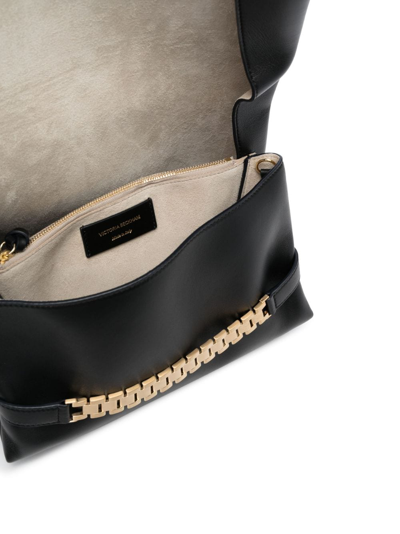 Shop Victoria Beckham Mini Chain Pouch Leather Clutch In Black