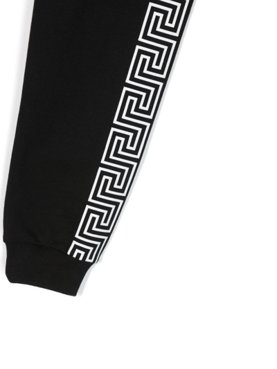 Shop Versace Monogram Cotton Track Pants In Black
