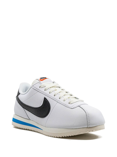 Shop Nike Cortez Low-top Sneakers In White