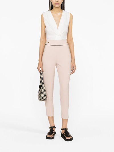 Shop Liu •jo Button-embellished Cropped Trousers In Pink