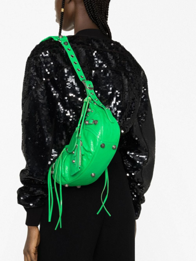 Balenciaga Le Cagole Xs Studded Crinkled-leather Shoulder Bag In Green