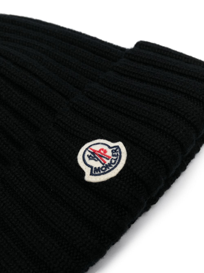 Shop Moncler Logo-appliqué Ribbed-knit Beanie In Black