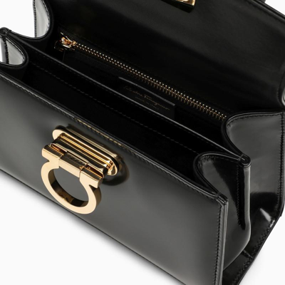 Shop Ferragamo Iconic Top Handle Bag In Black