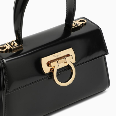 Shop Ferragamo Iconic Top Handle Bag In Black