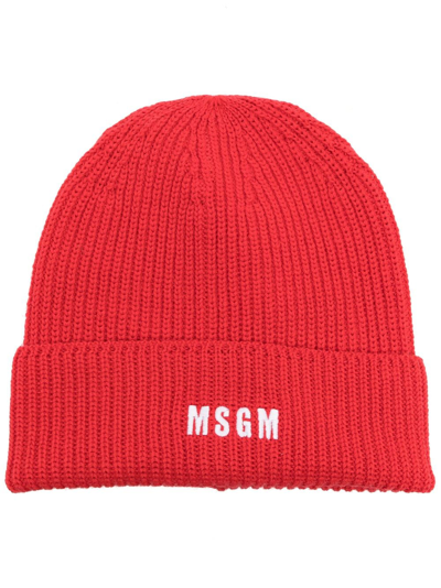 Shop Msgm Logo-embroidered Knitted Beanie In Red