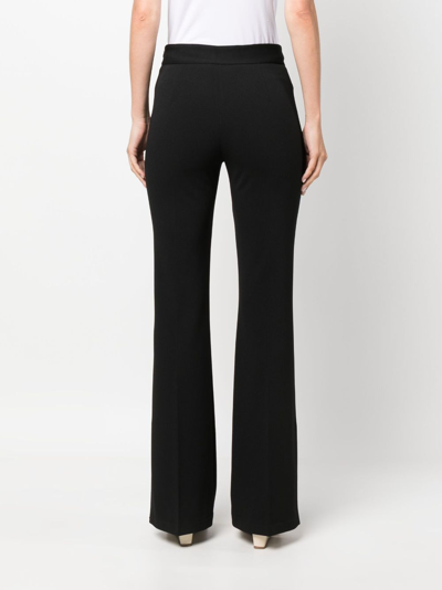 Shop Liu •jo High-waisted Flared Trousers In Black