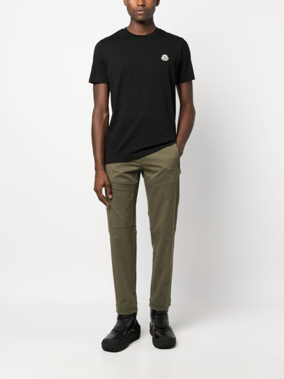 Shop Moncler Logo-patch Twill Tapered-leg Trousers In Green