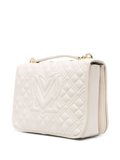 Shop Love Moschino Logo-plaque Quilted Shoulder Bag In Neutrals