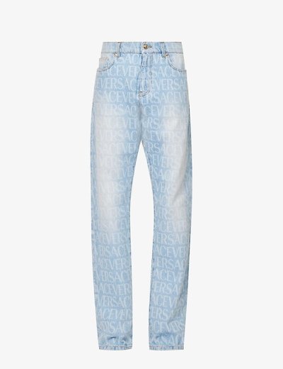 Shop Versace Brand-print Straight-leg Regular-fit Jeans In Azzuro