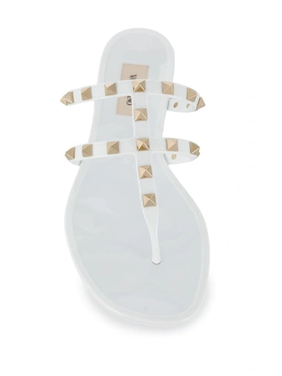 Shop Valentino Garavani Rockstud Thong Sandals In White