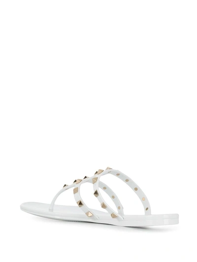 Shop Valentino Garavani Rockstud Thong Sandals In White