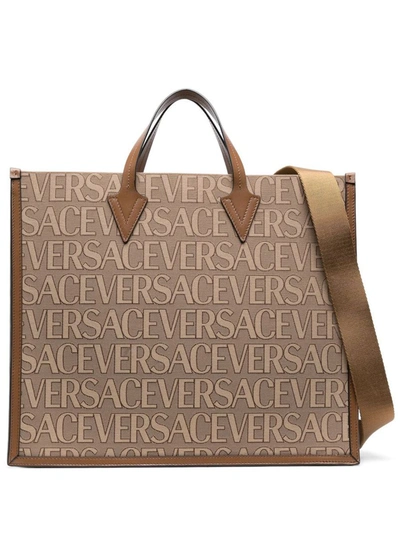 Shop Versace La Vacanza Versace All Over Logo Large Tote Bag In Beige